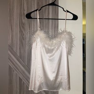 Off white tank top with faux feathers